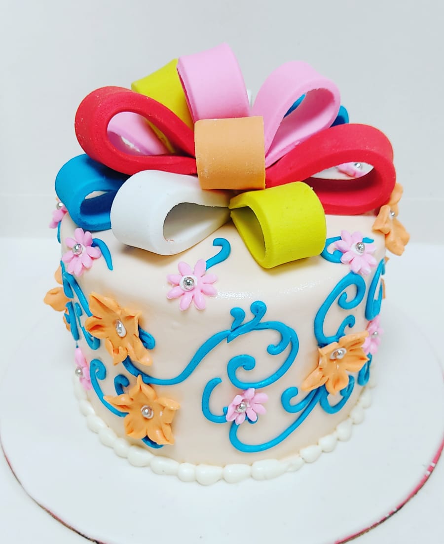Floral gift box cake	OC24