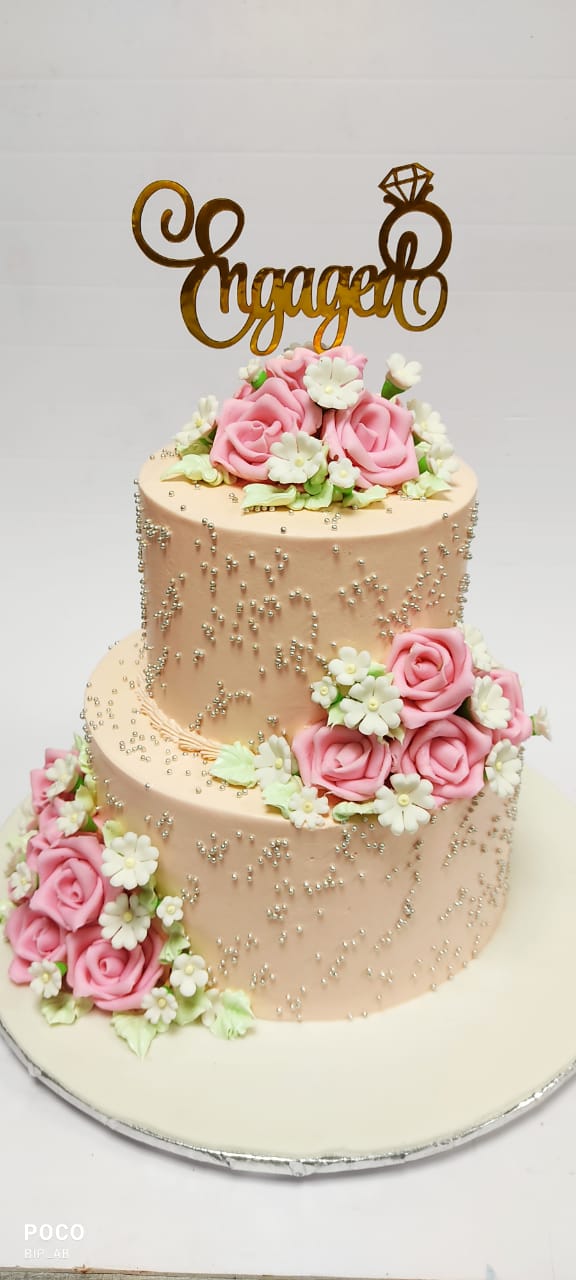 Peach engaged 2 tier cake with floral decoration (OC1)